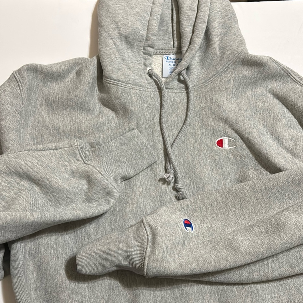Champions grey cropped long sleeve hoodie. Womens Sz XS.